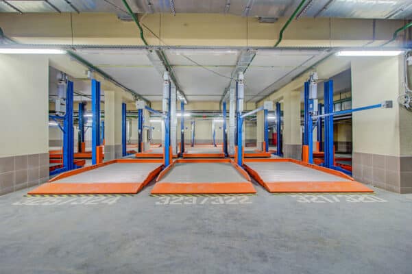Underground,Parking.,Empty,Garage.,Automatic,Elevator,To,Lift,The,Car,Stacker